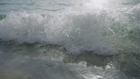 Slow-motion beach foam close-up on island. Stock Footage 170425387