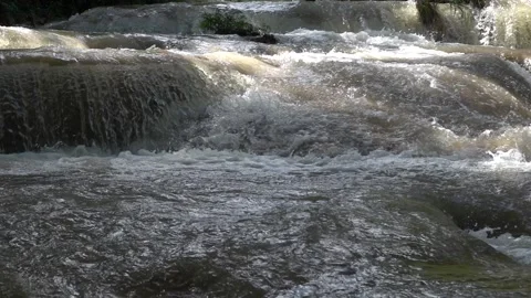Slow motion of Beautiful Clear Waterfall Cascade In Tropical Rainforest Video stock 255030783