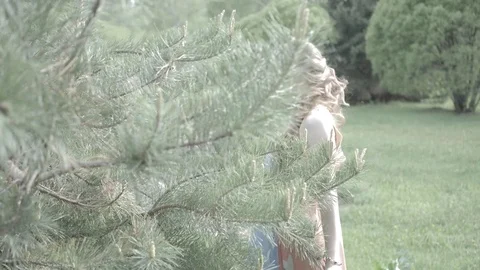 Slow motion. Beautiful model flirt in the forest. Stock Footage 76296347