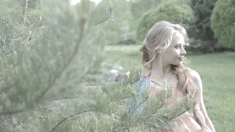 Slow motion. Beautiful model flirt in the forest. HD Stock Footage 76296433