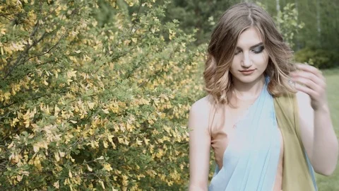 Slow motion. Beautiful model on vacation in the forest. HD Stock Footage 76295540