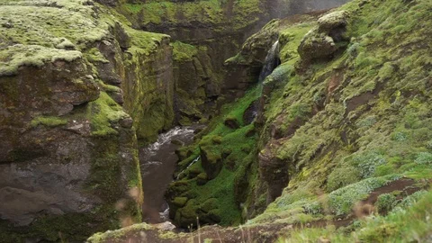 Slow motion of the Beautiful river in the green canyon with tiny waterfall in Video stock 125583089
