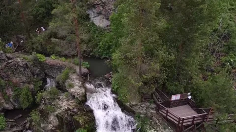 Slow motion beautiful waterfall in green forest, top view Stock Footage 155872938