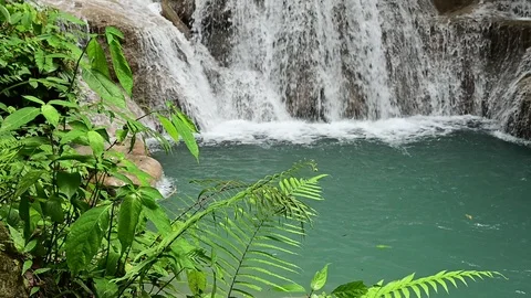 Slow motion. Beautiful waterfall is name Hua mae kamin waterfall in Erawan Na Stock Footage 119019243