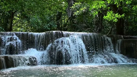 Slow motion. Beautiful waterfall is name Hua mae kamin waterfall in Erawan Na Stock Footage 119398684