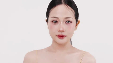 Slow motion of beautiful young Asian girl with k-beauty make up style. Stock Footage 338427565