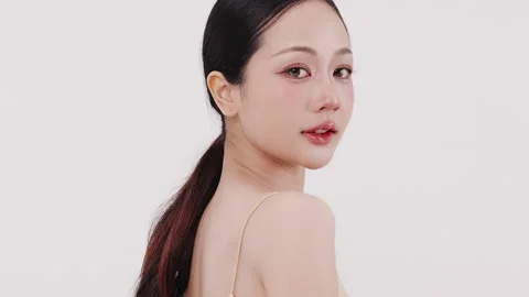 Slow motion of beautiful young Asian girl with k-beauty make up style. Stock Footage 338427674