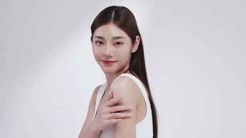 Slow motion of beautiful young Asian girl with k-beauty make up style. Stock Footage 343368881