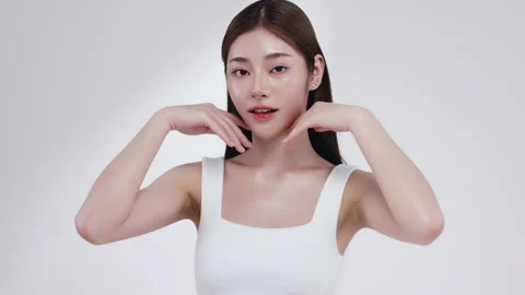 Slow motion of beautiful young Asian girl with k-beauty make up style. Stock Footage 343369256
