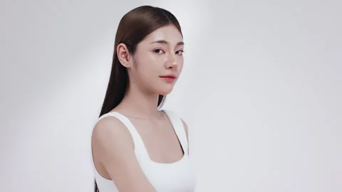 Slow motion of beautiful young Asian girl with k-beauty make up style. Stock Footage 343369328