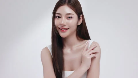 Slow motion of beautiful young Asian girl with k-beauty make up style. Stock Footage 343369522