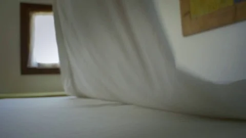 Slow motion bedding Stock Footage 76739560