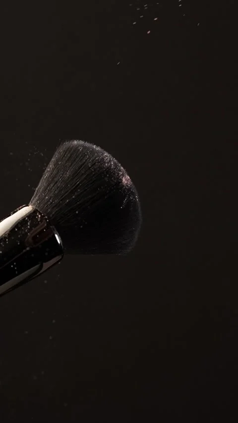 Slow Motion Beige Highlighter Falling on Makeup Brush  Macro Vertical Shot Stock Footage 312762388
