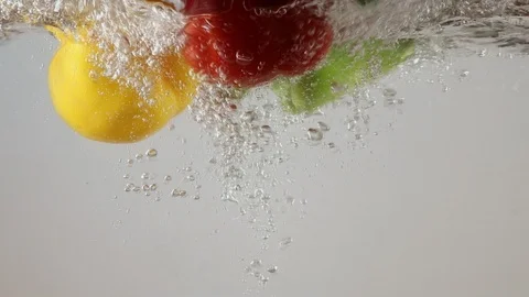 Slow motion Bell Pepper  with water splash and white background. 스톡 동영상 106049575