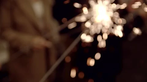 Slow motion. Bengal fire burns in hands. Stock Footage 164533800