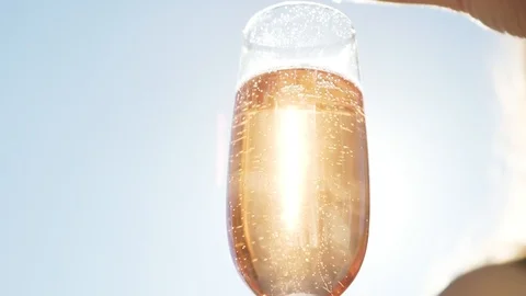 Slow motion berrys fall into pink champagne  스톡 동영상 100525126