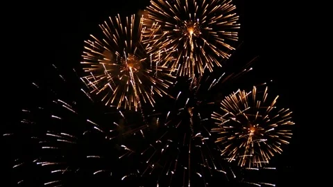 Slow motion of big fireworks exploding in the nightime sky during festival Video stock 82631077
