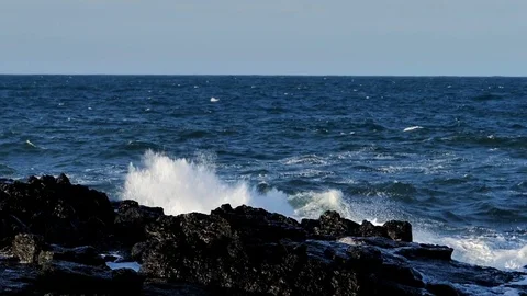 Slow motion big waves crashing on coastaline rocks Snaefellsness Iceland Stock Footage