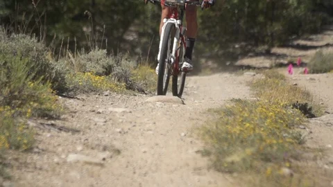 Slow Motion Biker On Mountain Trail 스톡 동영상 105886705