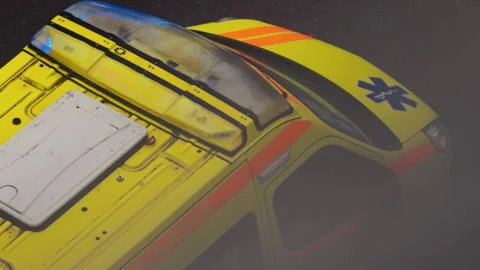 Slow Motion Bird's-Eye View of Ambulance with Flashing Lights in Street 스톡 동영상 276673862