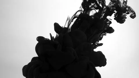 Slow motion of black ink droplets in water. Awesome abstract background Video stock 160906211