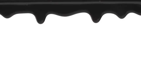 Slow motion of a black thick liquid dripping along top of the screen Stock Footage 194159331
