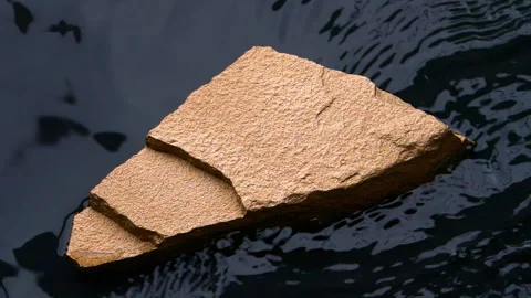 Slow motion of black water surface splashes, waves, ripples with golden stone 스톡 동영상 276879798