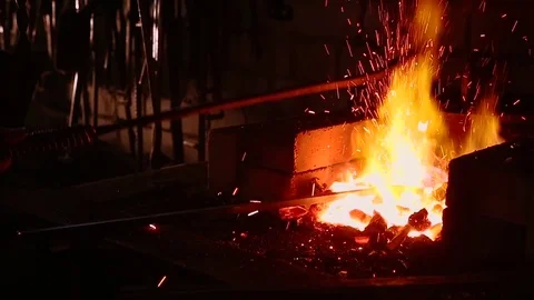 Slow Motion Blacksmith Forging a Sword Stock Footage 73975303