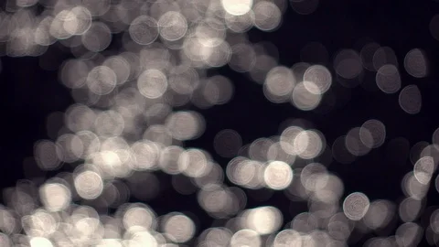 Slow motion of blinking specks on ripple water surface with low sun reflection. Stock Footage 119879232