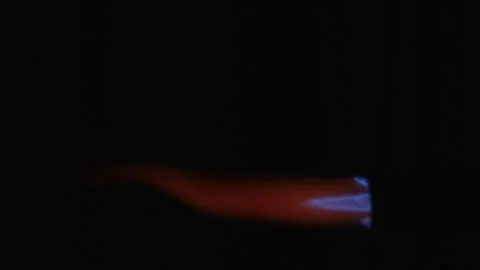 Slow motion. Blowtorch flame jet on a dark background Video stock 323707705