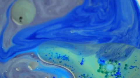Slow motion of blue and gray paint between each other. Video stock 281245319