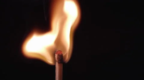 Slow motion of blue laser pointer lighting a match. Video stock 62324919