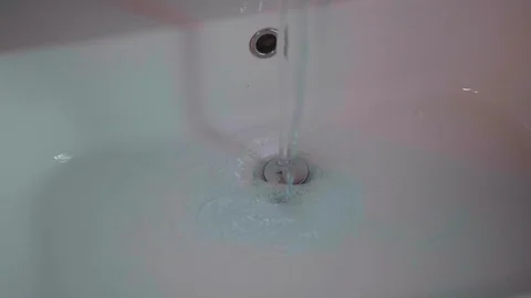 Slow motion of blue liquid on the withe background Stock Footage 124640633