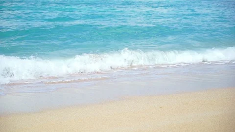 Slow motion Blue ocean wave on sandy beach Stock Footage 95645171