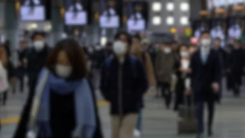 Slow motion Blurred crowd people with surgical mask walking in subway exit.-Dan Stock Footage 126722260