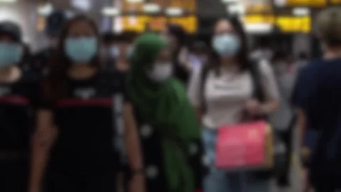 Slow motion blurred defocused view of people wearing the mask as coronavirus-Dan Stock Footage 137901920