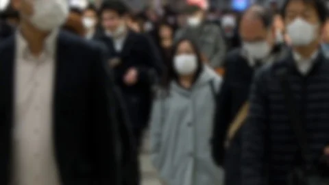 Slow motion Blurred people wearing mask against infectious diseases Covid-19-Dan Stock Footage 126722112