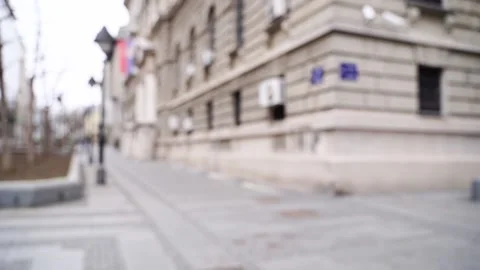 Slow motion blurred video on city street. Urban alley. Empty crosswalk. distance Video stock 200215228