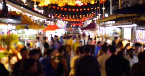 Slow motion blurry view of people crowd at night market of Kuala Lumpur Stock Footage 319012852
