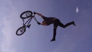 Slow Motion Bmx Tail Whip On Dirt Jump Stock Footage