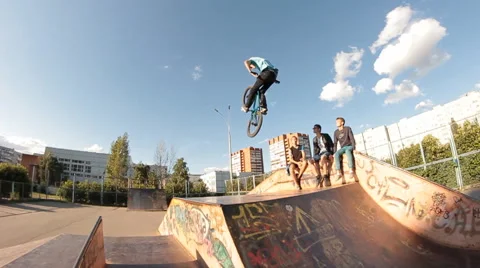 Slow motion bmx trick no hands in skate park Stock Footage 51541820