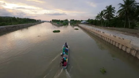 Slow motion of Boat on River at Sunset Stock Footage 312058835