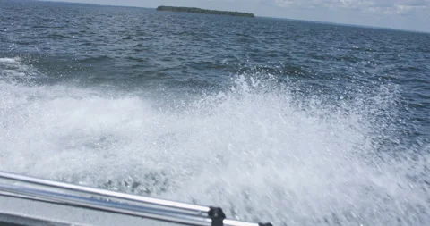 Slow Motion Boat Splash off the Side of a Boat Going 40mph Stock Footage 219299874