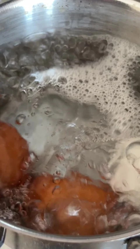 Slow Motion Boiling Eggs In Hot Water With Rising Bubbles Stock Footage 334653464