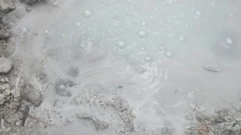 Slow motion of boiling mud bubbles and hot steam in the geyser Видео 319908909