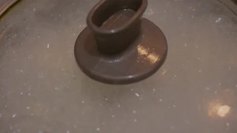Slow-motion Boiling Pot lid Video stock 138168841