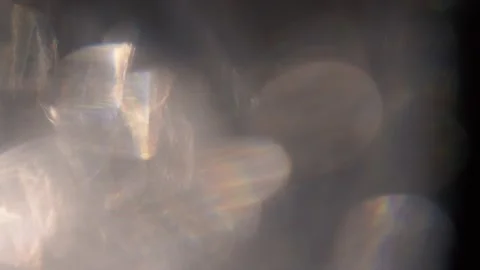 Slow Motion of Bokeh. Prism Rainbow Light Flares Stock Footage 191510708