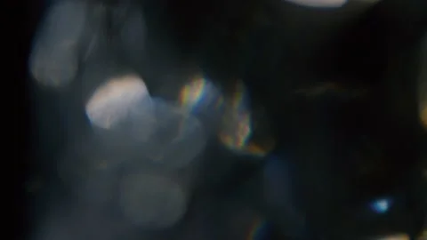 Slow Motion of Bokeh. Prism Rainbow Light Flares Stock Footage 191510971