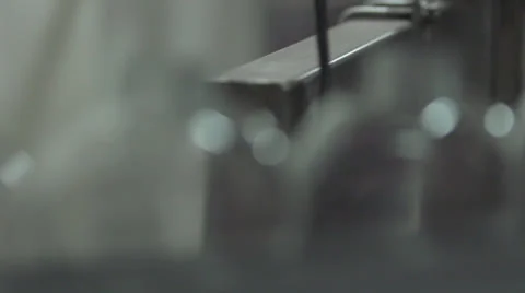 Slow Motion Bottles Getting Lids Put On HD Video Stock Footage 25944989