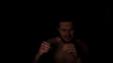 Slow motion - Boxer fighter punching the camera, sweating and training boxing Stock Footage 85766148